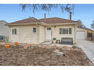 Charming single-story home featuring a well-maintained exterior and inviting front entrance at 1010 S Newton St, Denver, CO 80219