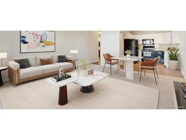 A comfortable living room with modern furniture and a stylish kitchen area in the background at 585 S Alton Way # 6B, Denver, CO 80247