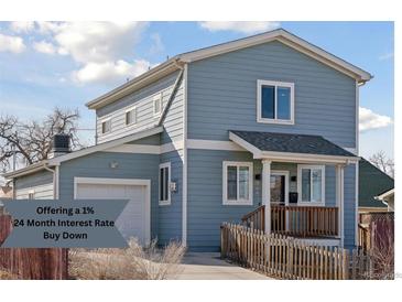 Charming two-story home with light blue siding, white trim, and a cozy front porch at 760 W Asbury Ave, Denver, CO 80223