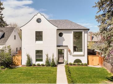 Striking modern exterior with unique architectural details and manicured front yard at 535 Albion St, Denver, CO 80220