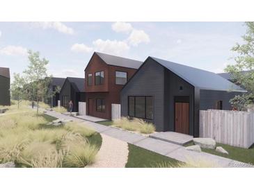 Modern home exteriors featuring unique designs, natural landscaping, and pedestrian-friendly walkways at 733 Turner St, Erie, CO 80516