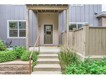 Front entrance with stairs, landscaping, and a covered porch at 4137 Clifton Ct, Boulder, CO 80301