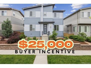 Charming two-story home boasts modern curb appeal with neat landscaping, plus $25,000 buyer incentive at 9682 Dunning Cir, Highlands Ranch, CO 80126