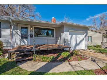 Charming single-story home with a covered front porch, well-maintained lawn, and an attached single car garage at 2777 S Adams St, Denver, CO 80210