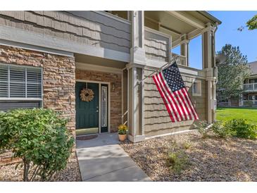 Charming home exterior featuring stone accents and a welcoming entrance at 4385 S Balsam St # 10-103, Littleton, CO 80123