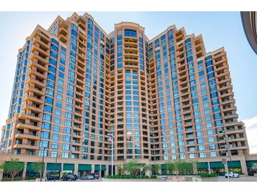 A stunning full exterior view of the high-rise Penterra Plaza building showing all the balcony's and windows at 8100 E Union Ave # 310, Denver, CO 80237