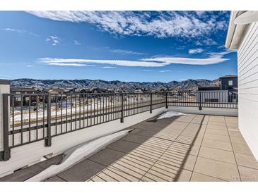 Rooftop deck with mountain views and metal railing at 9633 Browns Peak Cir, Littleton, CO 80125