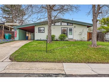 Charming single-story home with a well-manicured lawn and a covered carport at 7948 Stuart St, Westminster, CO 80030