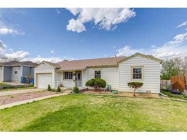 Charming single-story home with well-manicured lawn and freshly painted exterior at 1881 E 95Th Ave, Thornton, CO 80229