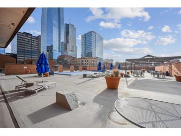 Relaxing rooftop pool and deck with city views at 1551 Larimer St # 2805, Denver, CO 80202