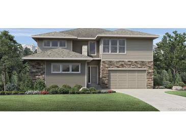 Charming two-story home with a mix of stone and siding, plus an attached two-car garage and a well-manicured front yard at 6309 Cristobal Pt, Parker, CO 80134