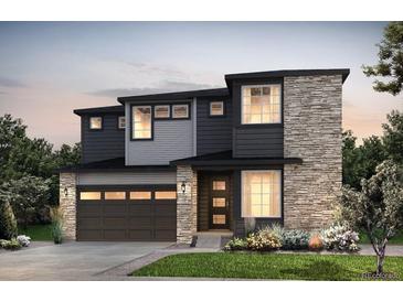 Two-story home with stone accents and a modern design at 3814 N Duquesne St, Aurora, CO 80019