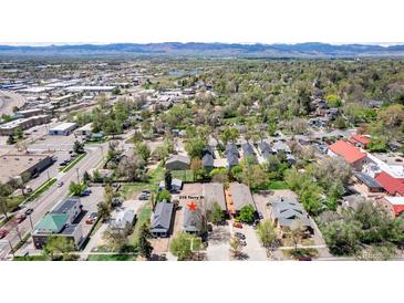 Wide aerial showcasing house location and mountain views at 219 Terry St, Longmont, CO 80501