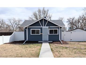 Charming single-story home with a well-maintained front yard and attractive curb appeal at 1164 Wabash St, Denver, CO 80220