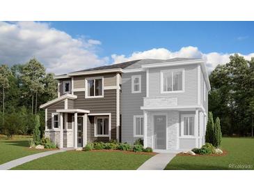 Modern two-story home with attached garage and landscaping at 22821 E Stanford Ln # B, Aurora, CO 80015