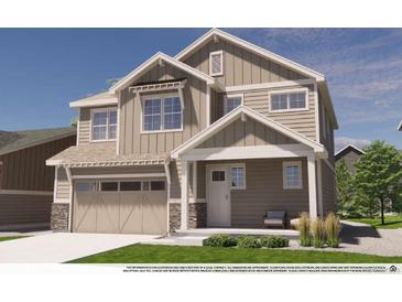 Charming two-story home with a two-car garage and inviting front porch at 812 Mulberry St, Louisville, CO 80027