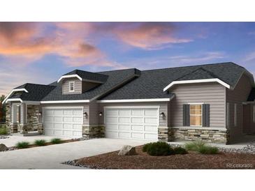 Charming single Gathering home with a three-car garage and beautiful stone accents at 3381 N Denali St, Aurora, CO 80019
