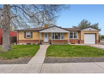 Charming brick ranch-style home with a well-manicured front yard and an attached one-car garage at 1860 W Crestline Dr, Littleton, CO 80120