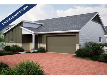 New construction home with attached garage and landscaped yard at 21945 E 51St Dr, Aurora, CO 80019