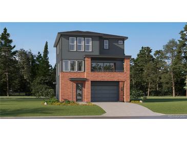 Striking three-story home featuring a mixed facade of brick and siding, plus an attached two-car garage at 7724 S Cherokee Trl, Centennial, CO 80016