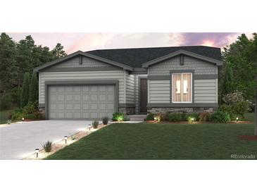 Charming single-Gathering home featuring a two-car garage and well-manicured front lawn with landscape lighting at 4295 Gozzer Ranch Dr, Elizabeth, CO 80107