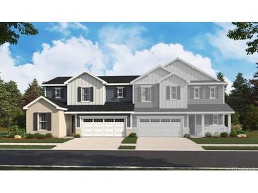 Charming two-story home with inviting curb appeal, garage, and professionally landscaped yard at 6646 N Nepal St, Aurora, CO 80019
