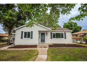 Charming single-story home with a well-maintained front yard and inviting curb appeal at 1809 W Crestline Dr, Littleton, CO 80120