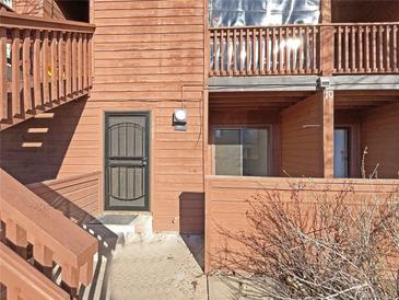 Exterior view of condo building, showing entrance and stairs at 540 S Forest St # 10-101, Denver, CO 80246