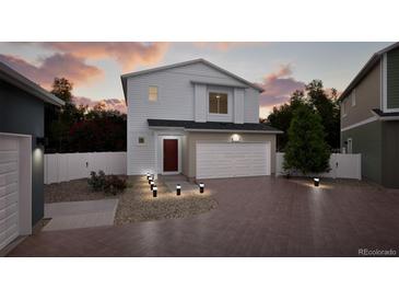 Charming two-story home with a modern design, manicured lawn, and inviting curb appeal at 22172 E 38Th Pl, Aurora, CO 80019