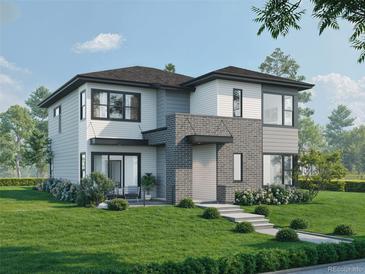 Charming two-story home with landscaped yard and welcoming entrance at 370 S Glencoe St, Denver, CO 80246