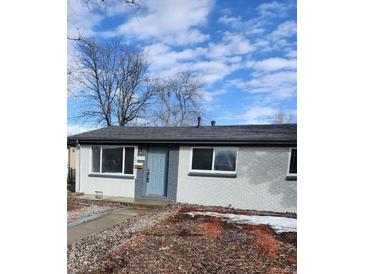 Charming single-story home with a well-maintained exterior and updated paint scheme and landscape at 2510 Kenton, Aurora, CO 80010