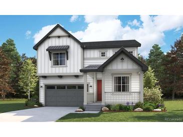 Charming two-story home featuring a modern farmhouse design with a welcoming front porch and attached two-car garage at 8273 Snake River St, Littleton, CO 80125