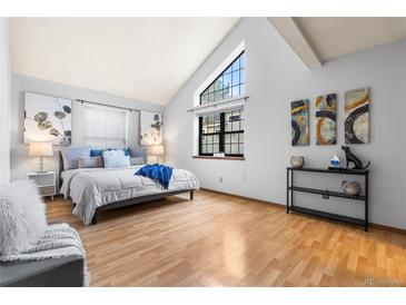 Bright main bedroom with vaulted ceiling and large windows at 942 S Walden St # 204, Aurora, CO 80017