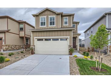 Charming two-story home with a two car garage and neutral colored exterior at 16135 Mountain Flax Dr, Monument, CO 80132