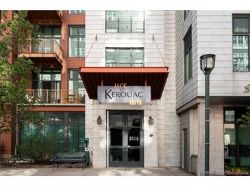 View of the entryway to the Jack Kerouac Lofts building at 3100 Huron St # 1B, Denver, CO 80202