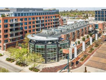 Beautiful view of the building featuring unique architecture and landscaping at 105 Fillmore St # 209, Denver, CO 80206