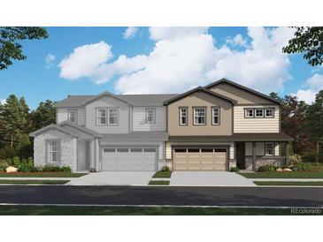 Charming two-story home with neutral siding, covered porch, and manicured front lawn for curb appeal at 6576 N Nepal St, Aurora, CO 80019