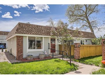 Charming single story home with a well-manicured lawn and mature landscaping for excellent curb appeal at 2012 W 101St Ave, Thornton, CO 80260