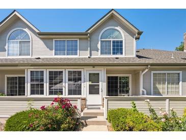 Charming townhome featuring a well-maintained facade, attractive landscaping, and a welcoming entrance with abundant natural light at 1124 E 130Th Ave # C, Thornton, CO 80241