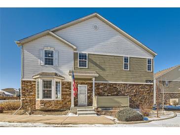 Inviting two-story home with stone accents and landscaping at 12704 Jasmine St # E, Thornton, CO 80602