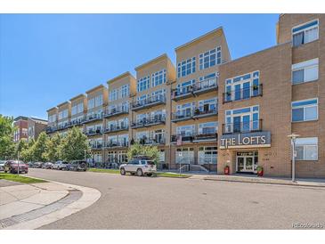 Apartment building with balconies and large windows in a modern, urban setting at 7240 W Custer Ave # 417, Lakewood, CO 80226