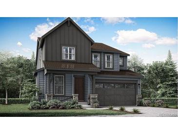 Charming two-story home with a gray exterior, a covered front porch, and a two-car garage at 12626 W Frost Ave, Littleton, CO 80127
