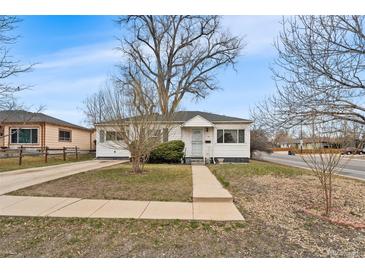 Charming single story home with mature trees and quaint front yard at 75 Vrain St, Denver, CO 80219