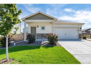 Inviting single-Gathering home with a well-manicured lawn and a two-car garage at 7222 Aspen Brook Ave, Frederick, CO 80530