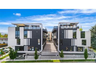 Modern condos boast striking black and white exterior, rooftop terraces, and attractive landscaping at 5125 W 29Th Ave # 5, Denver, CO 80212