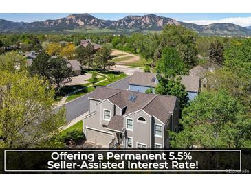 Charming two-story home with well-maintained landscaping and mountain views at 5523 Stonewall Pl, Boulder, CO 80303