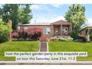 Charming brick home featuring a cozy front porch and beautifully landscaped front yard, perfect for outdoor enjoyment at 5044 W Moncrieff Pl, Denver, CO 80212
