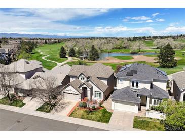 A beautiful aerial view of the property nestled within a golf course community at 4373 E Phillips Pl, Centennial, CO 80122