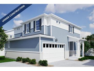 New two-story home featuring a two-car garage and charming exterior design at 22343 E 38Th Pl, Aurora, CO 80019