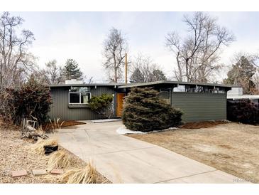 Charming single-story home with a unique architectural design and well-maintained front yard at 1459 S Filbert Way, Denver, CO 80222